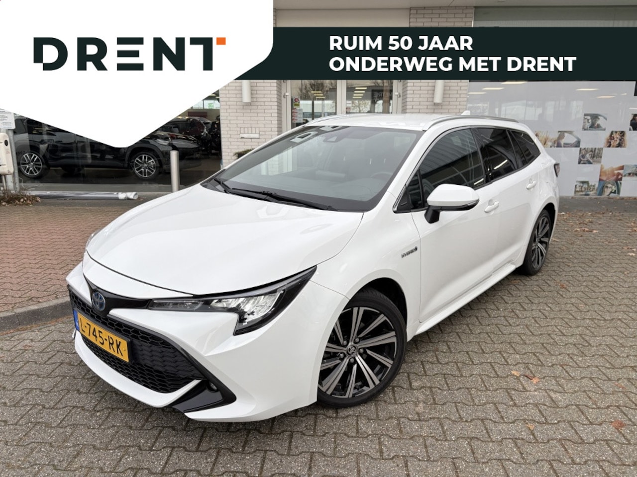 Toyota Corolla Touring Sports - 1.8 Hybrid Dynamic | Stoelverwarming | Draadloze Telefoonlader | - AutoWereld.nl