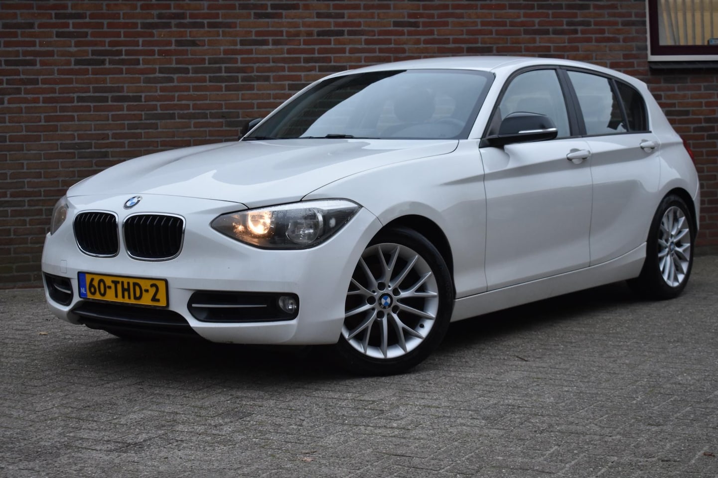 BMW 1-serie - 118i Business '12 MOTOR DEFECT Airco Sport stoelen - AutoWereld.nl