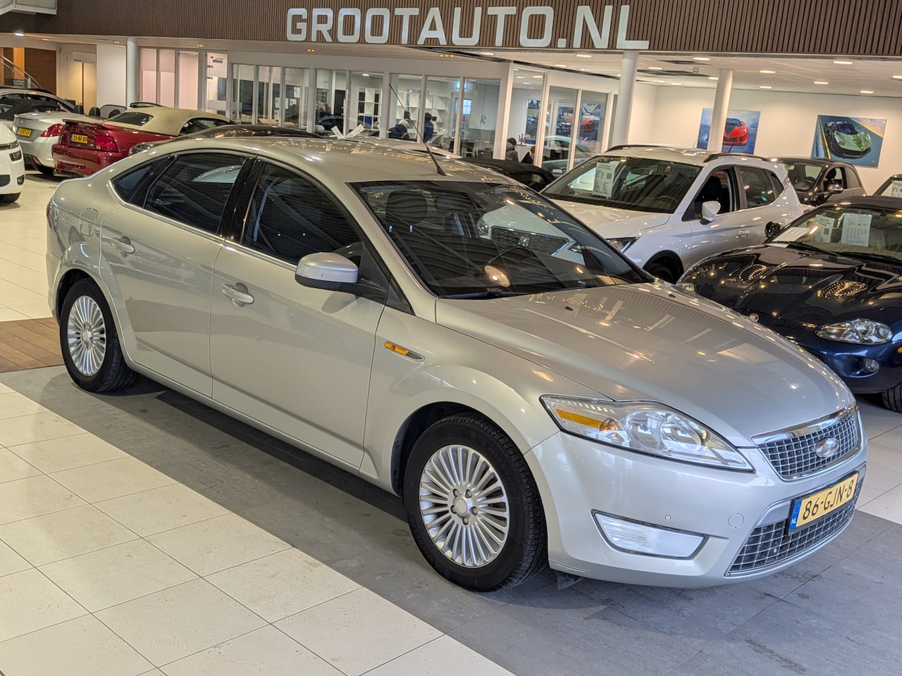 Ford Mondeo - 2.0-16V Titanium Airco, Cruise Control, Trekhaak, Stuurbekrachtiging - AutoWereld.nl