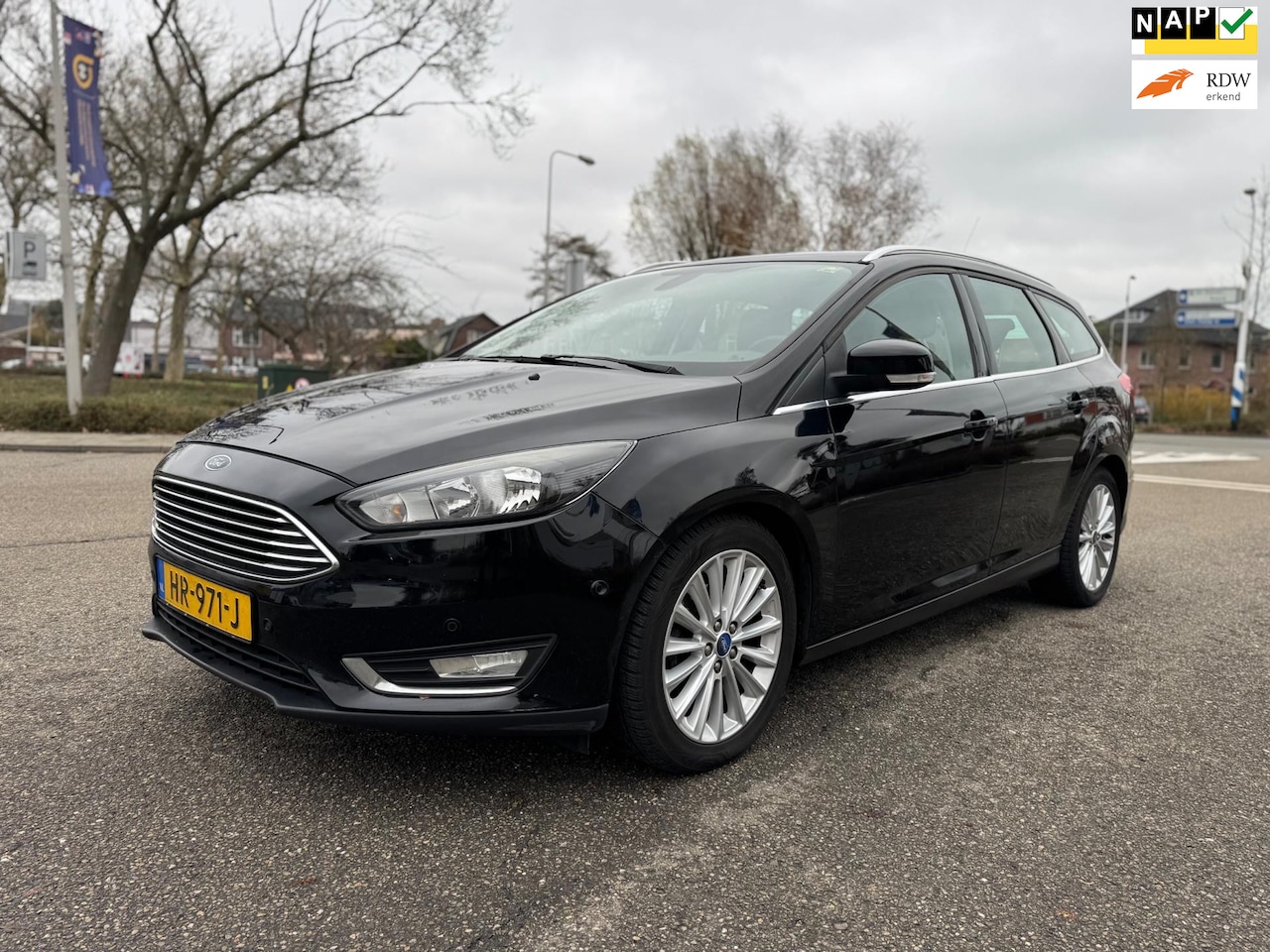 Ford Focus Wagon - 1.0 Titanium Edition / dealer.onderhouden / airco / cruise.control / pdc / lmv / historie - AutoWereld.nl