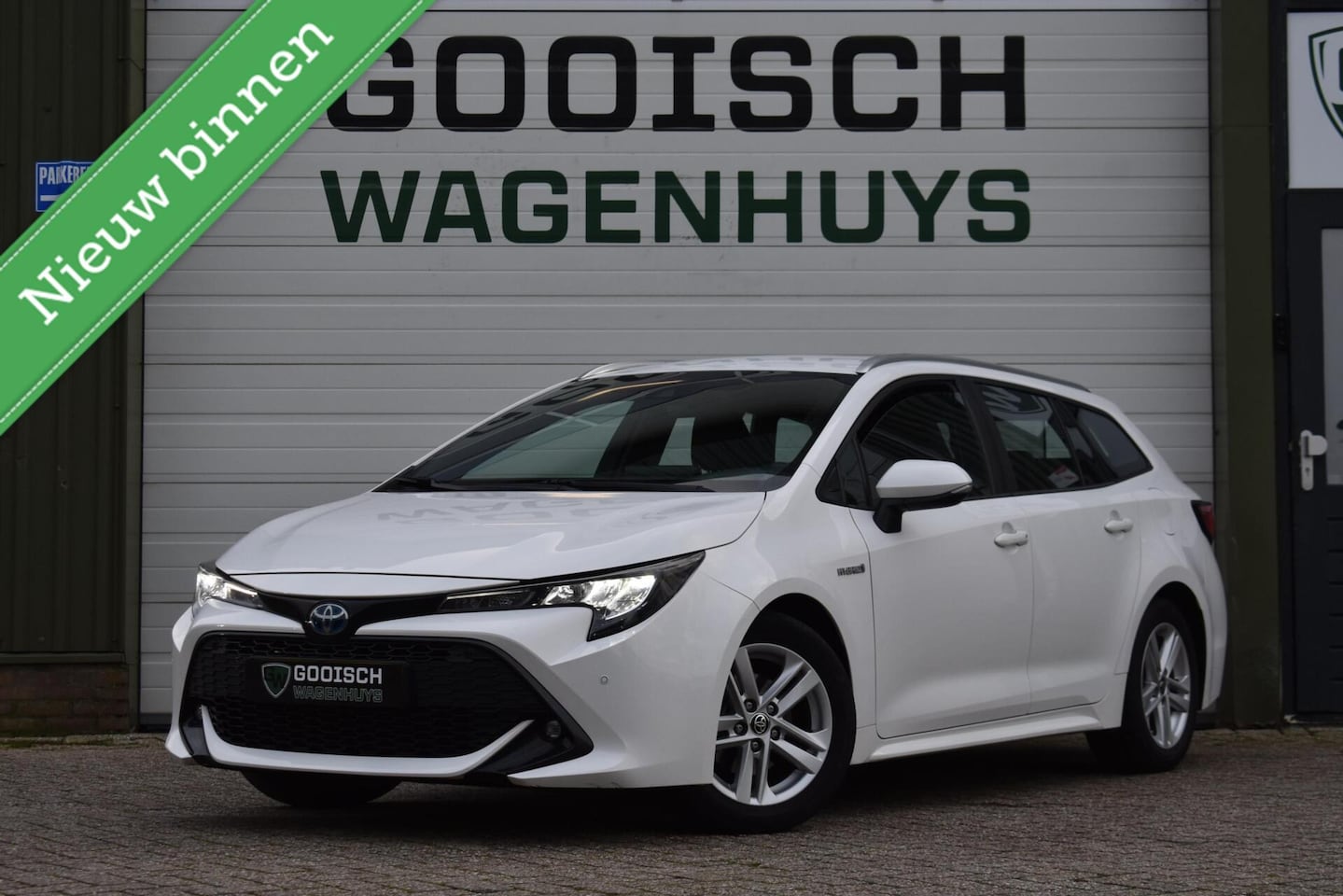 Toyota Corolla Touring Sports - 1.8 Hybrid Active | Trekhaak | Carplay | Camera | Stoelverwarming | - AutoWereld.nl