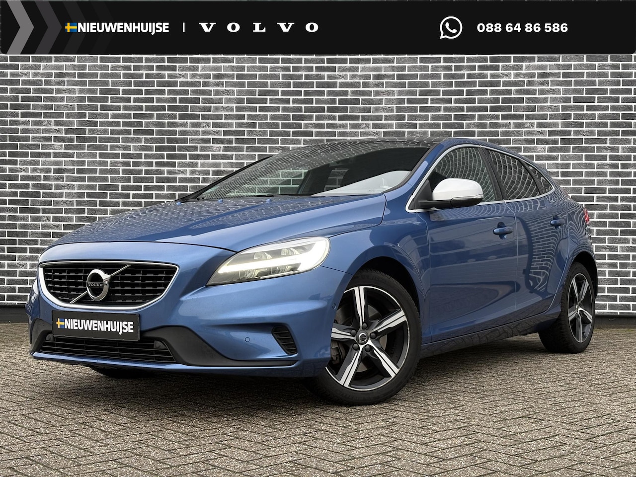 Volvo V40 - 2.0 T4 Business Sport | Trekhaak | Panoramadak | Lederen bekleding | Parkeersensoren voor - AutoWereld.nl