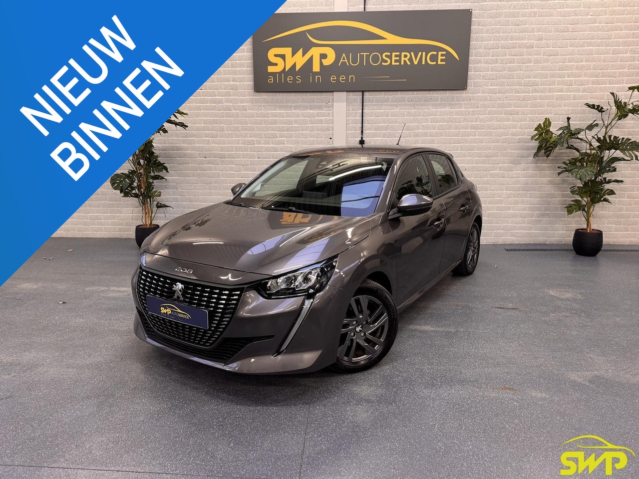 Peugeot 208 - 1.2 PureTech Active Pack | Navi | Automaat | Metallic grijs - AutoWereld.nl