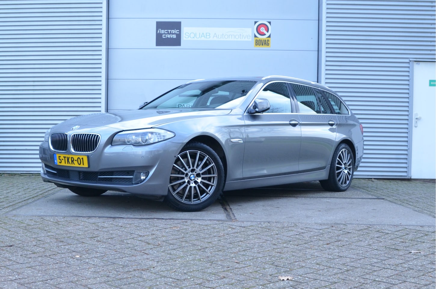 BMW 5-serie Touring - 528i High Executive Pano, Leder, Winterbanden, Softclose - AutoWereld.nl