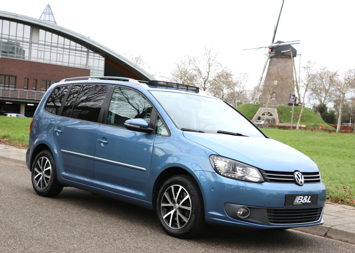 Volkswagen Touran - 1.4 TSI Aut DSG 170Pk Highline 7-Persoons 1e eigenaar Full Option Panoramadak Trekhaak Par - AutoWereld.nl
