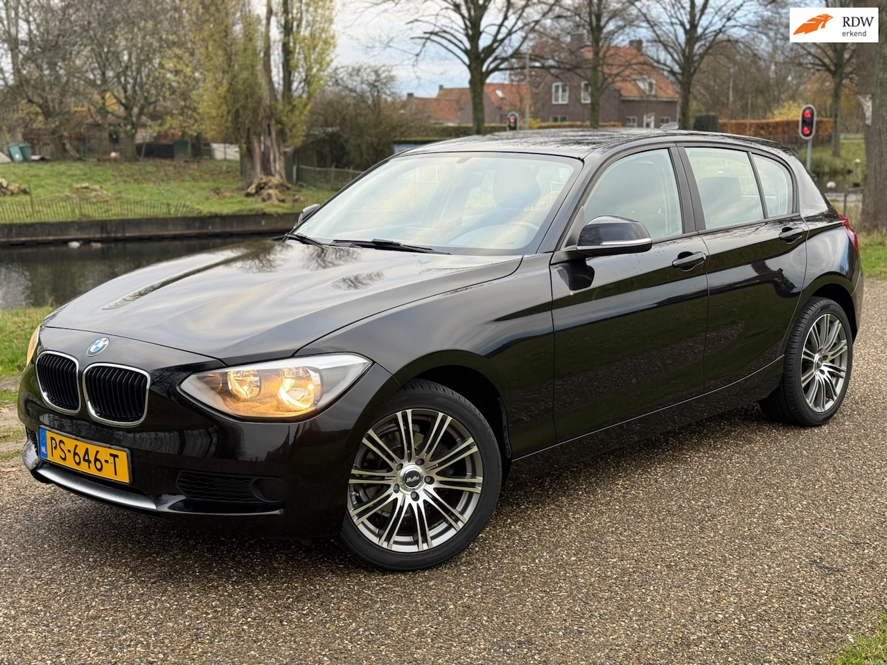 BMW 1-serie - 114i EDE|Airco|Navigatie|5 deurs - AutoWereld.nl