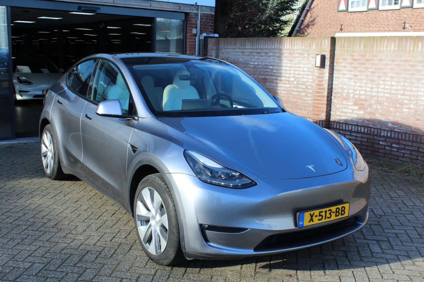 Tesla Model Y - Long Range AWD 75 kWh WIT LEER / 14.209 km !! - AutoWereld.nl