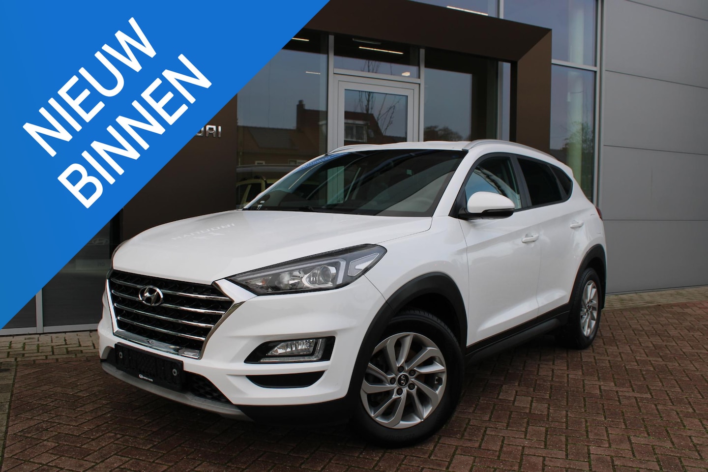 Hyundai Tucson - 1.6 T-GDI 177pk Comfort Automaat Airco Navi Carplay Trekhaak Zeer mooi! - AutoWereld.nl
