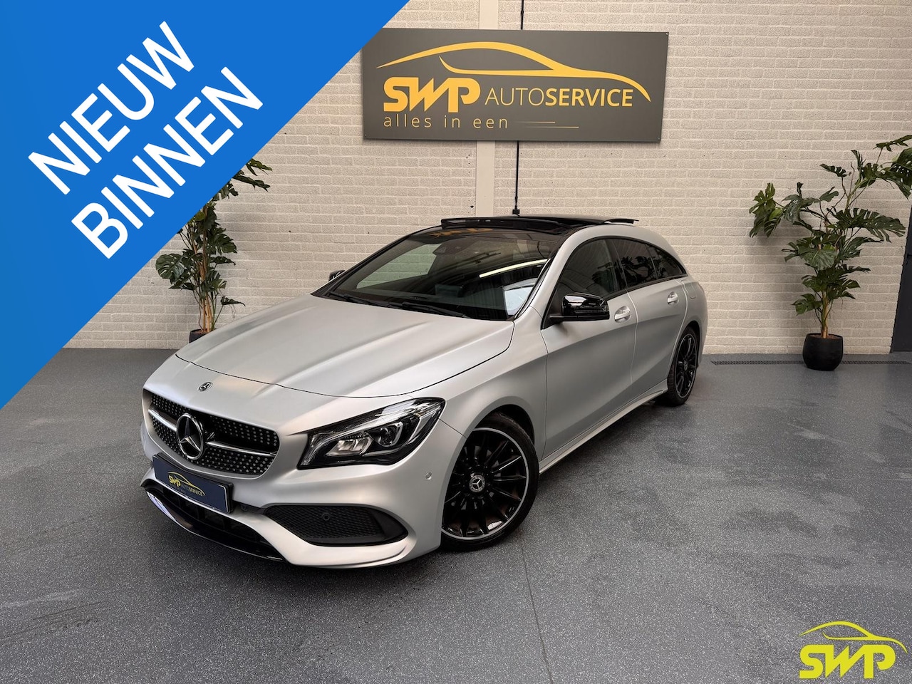 Mercedes-Benz CLA-klasse Shooting Brake - 180 | AMG | MAGNO-ZILVER | Pano | Navi | Dodehoek | Memory | Elektr Stoel | Multispaak | E - AutoWereld.nl