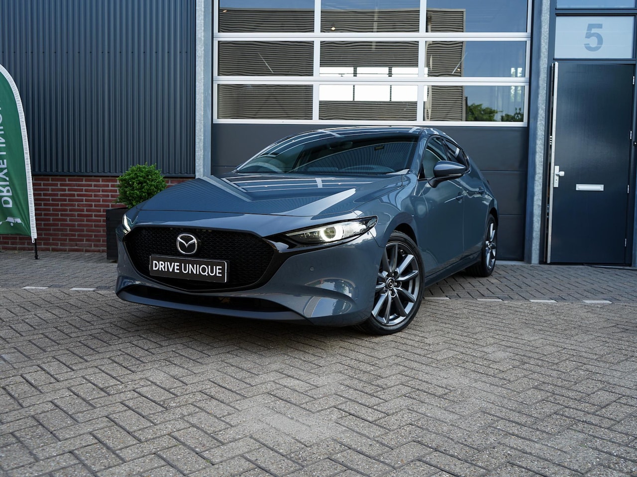 Mazda 3 Sport - 2.0 e-SkyActiv-G M Hybrid 150 Sportive - AutoWereld.nl