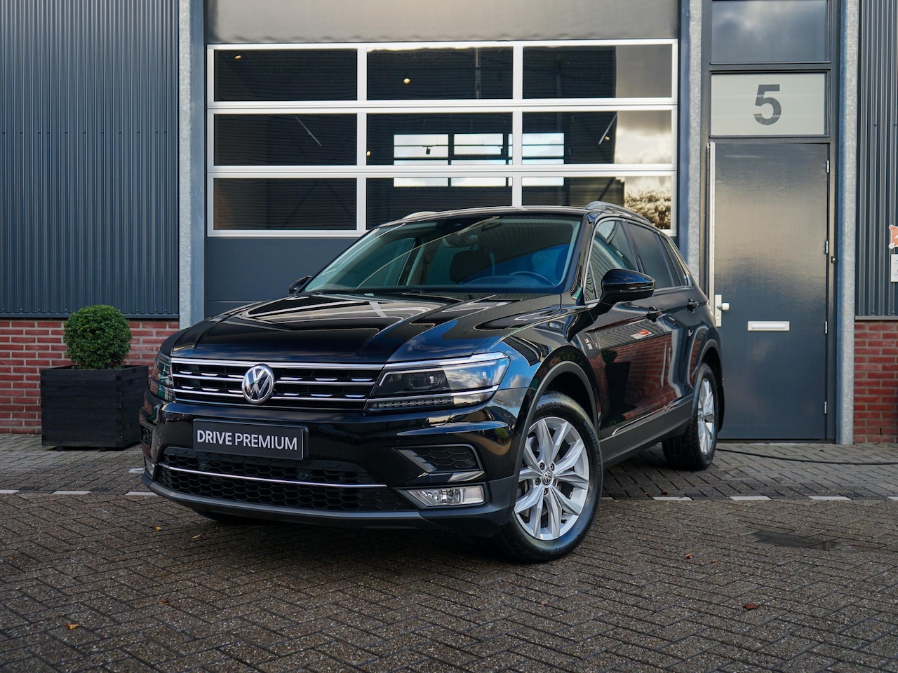 Volkswagen Tiguan - 2.0 TSI 4Motion Highline 2.0 TSI 4Motion Highline - AutoWereld.nl
