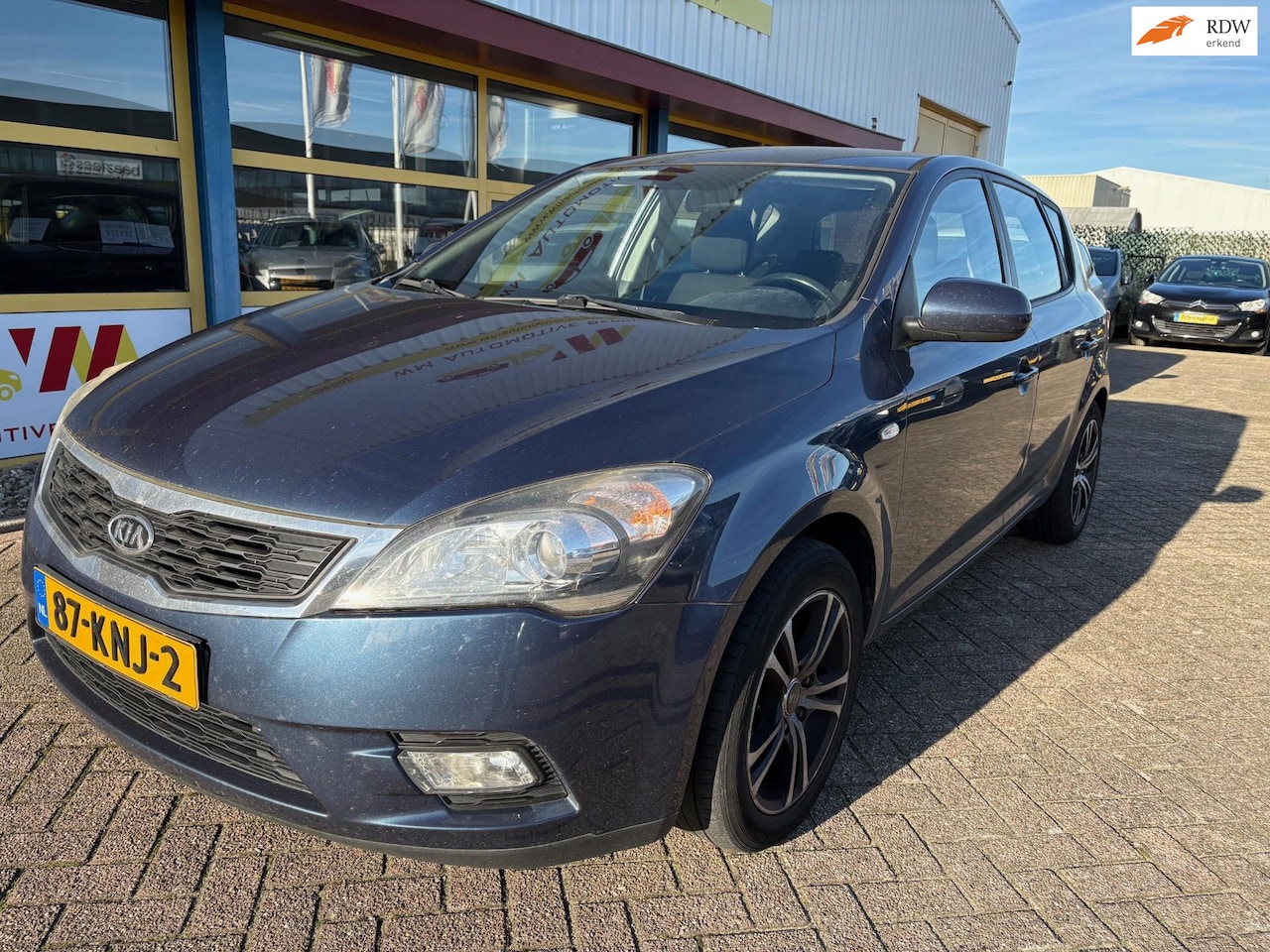 Kia Cee'd - 1.4 CVVT X-ecutive AIRCO - AutoWereld.nl