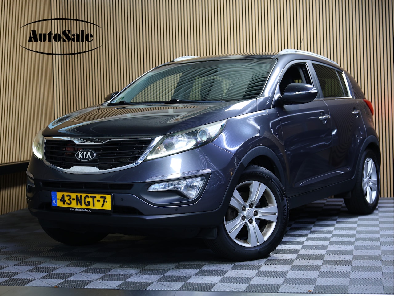 Kia Sportage - 2.0 X-Ecutive Plus Pack AUTOMAAT LEER BT PDC TREKHAAK '10 - AutoWereld.nl