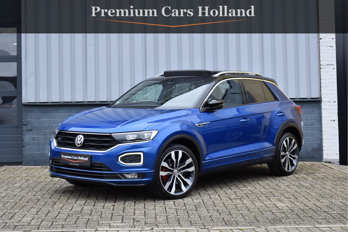 Volkswagen T-Roc - 1.5 TSI R-Line Pano Navi ACC Camera 19 Inch Suzuka - AutoWereld.nl