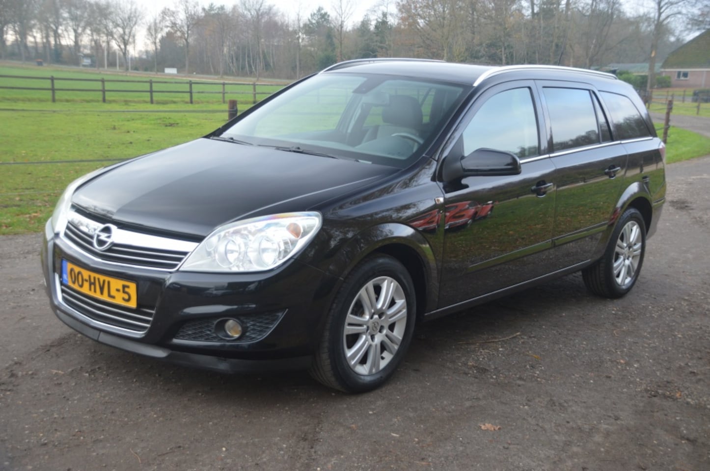 Opel Astra Wagon - 1.6 Cosmo Leer PDC Navi - AutoWereld.nl