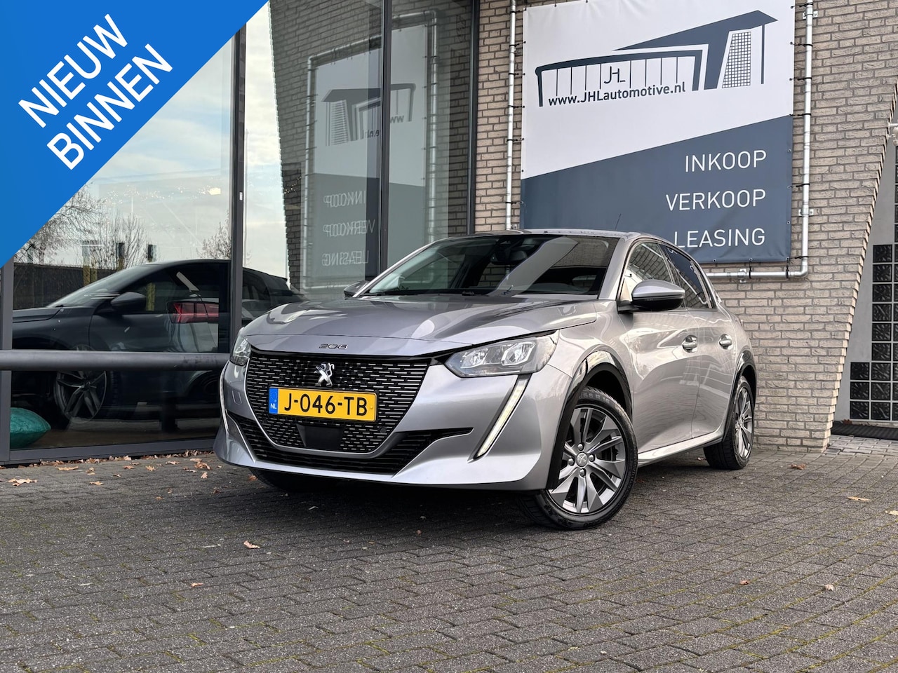 Peugeot e-208 - EV Allure 50 kWh*3FASE*CRUISE*ECC*CARPLAY*CAM* - AutoWereld.nl