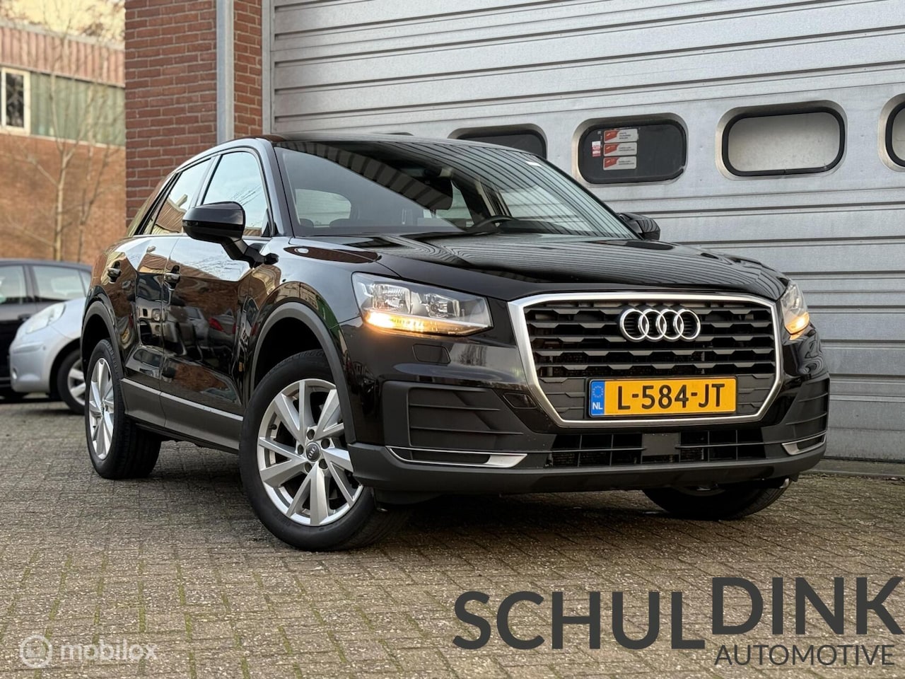 Audi Q2 - 1.0 TFSI Sport AUTOMAAT|STOELVERWARMING|CRUISE CONTROLE - AutoWereld.nl