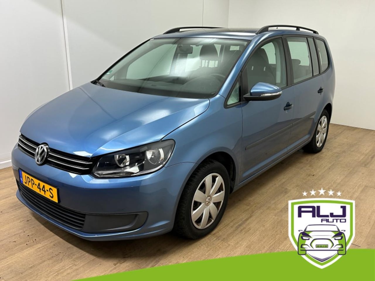Volkswagen Touran - Occasion | Blauw | Tweedehands Volkswagen Touran | 7-zits | Airco | Cruisecontrol | Blueto - AutoWereld.nl