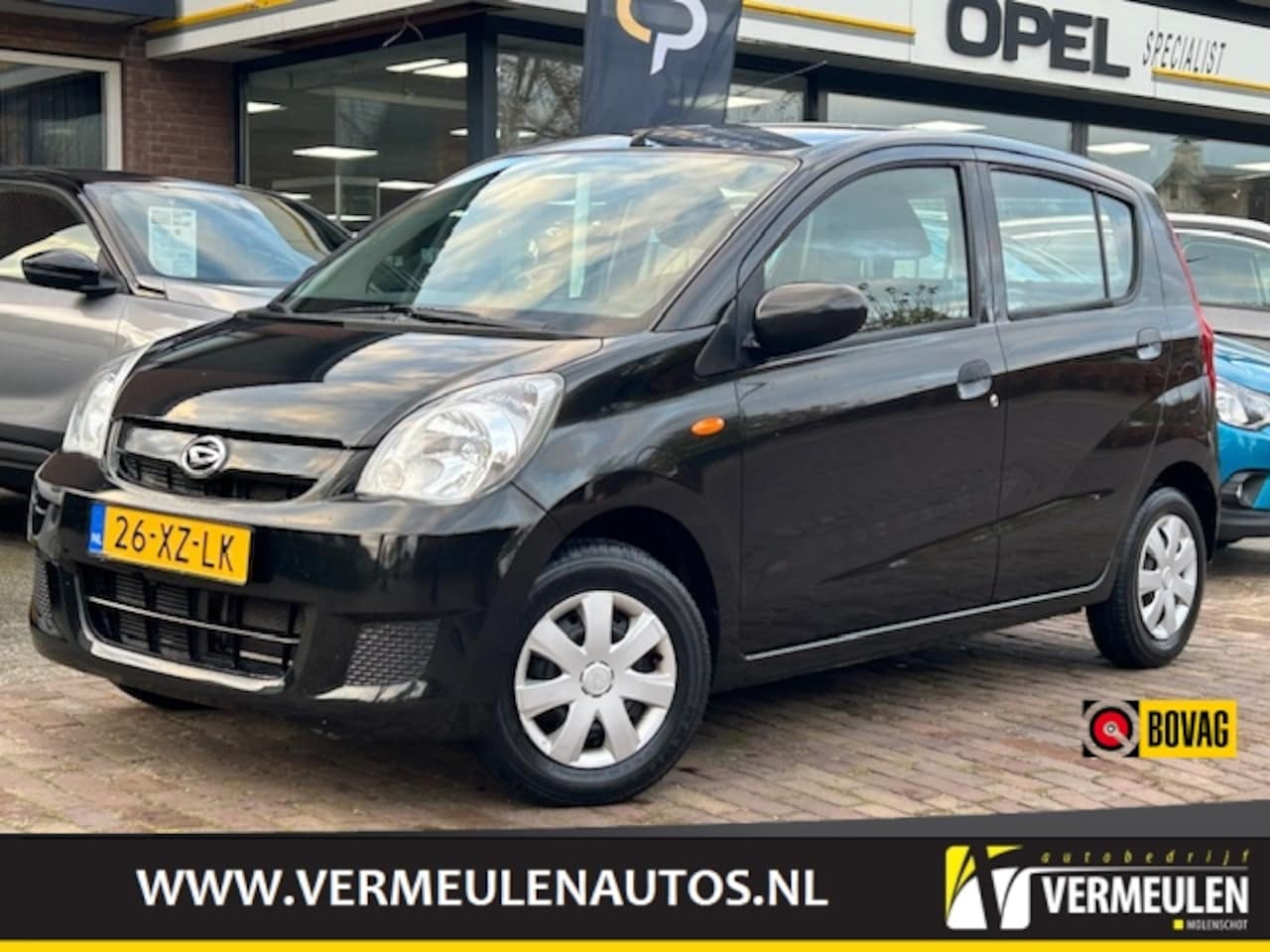 Daihatsu Cuore - 1.0 51KW 5D Trend + Airco / Audio/ APK tot 15-11-2026 - AutoWereld.nl