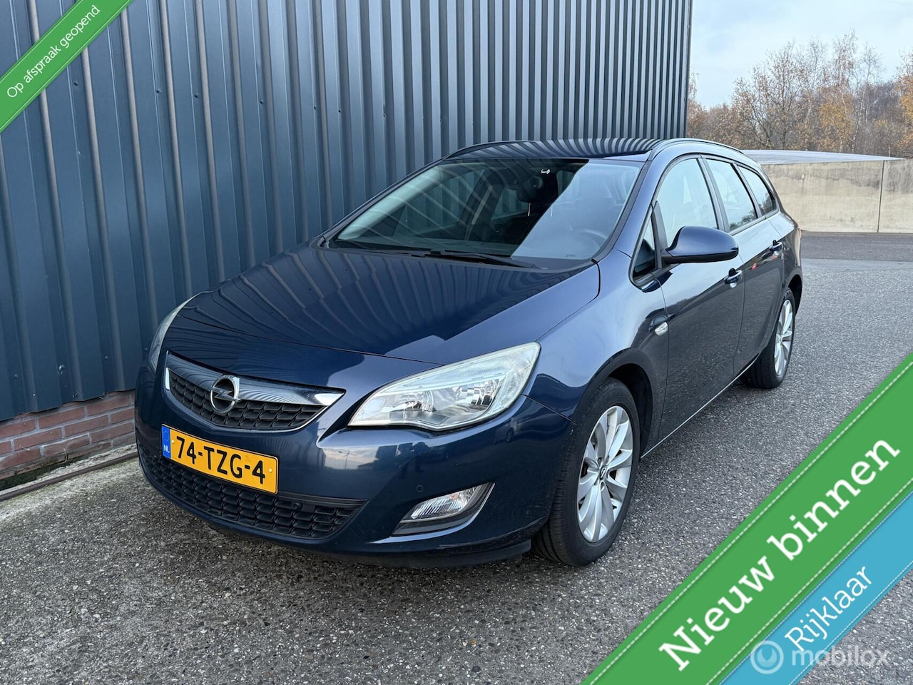 Opel Astra Sports Tourer - 1.4 Turbo Anniversary Edition 1.4 Turbo Anniversary Edition - AutoWereld.nl