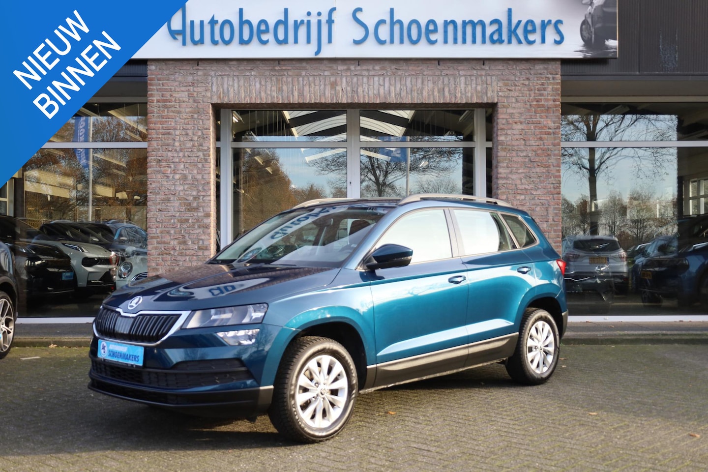 Skoda Karoq - 1.0 TSI Business Edition CARPLAY CAMERA SFEERVERL. STOELERW. DAB CRUISE CLIMA NAVI 2XPDC L - AutoWereld.nl