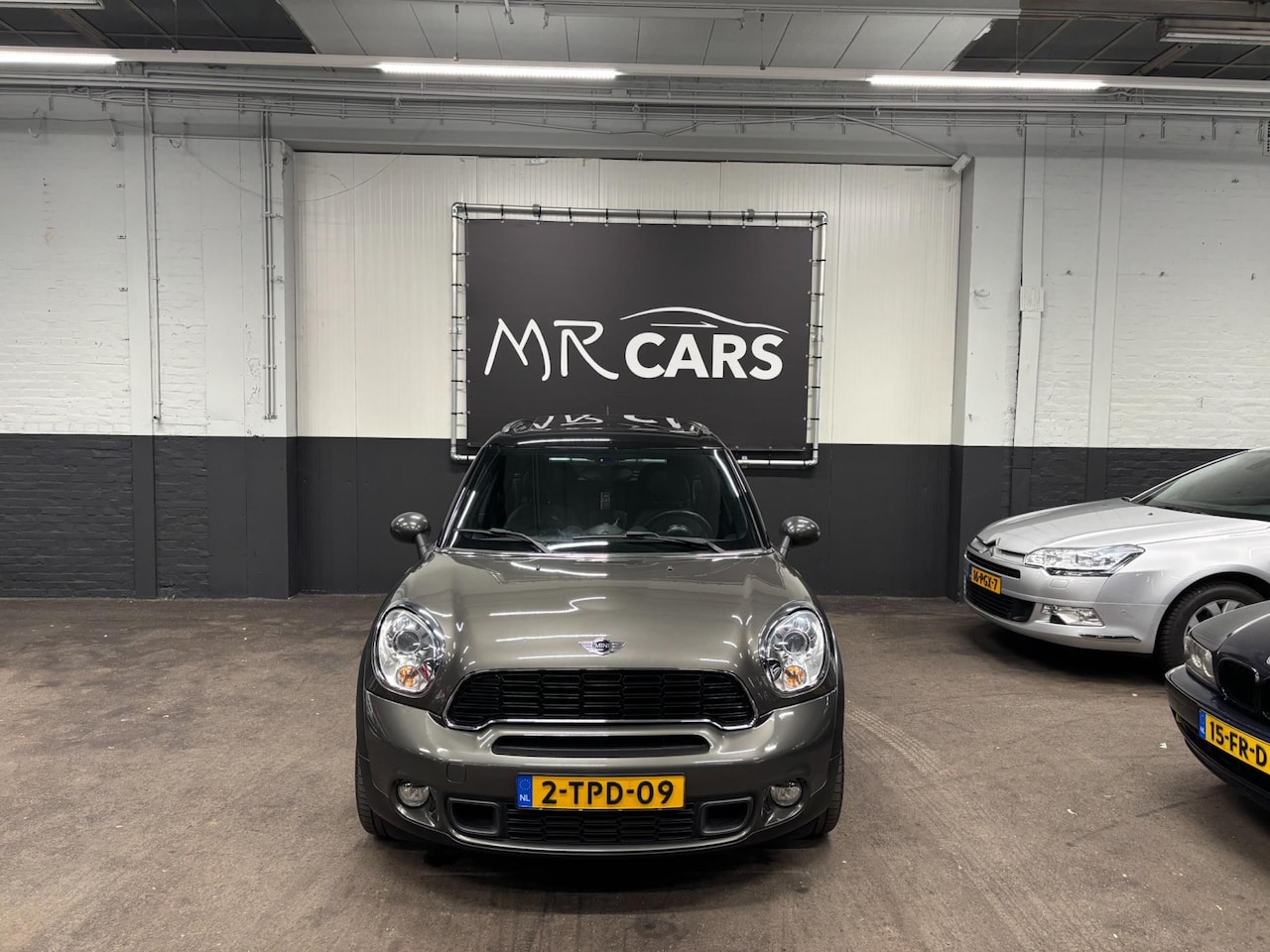 MINI Countryman - Mini 1.6 Cooper S ALL4 Chili pano/leder/clima - AutoWereld.nl