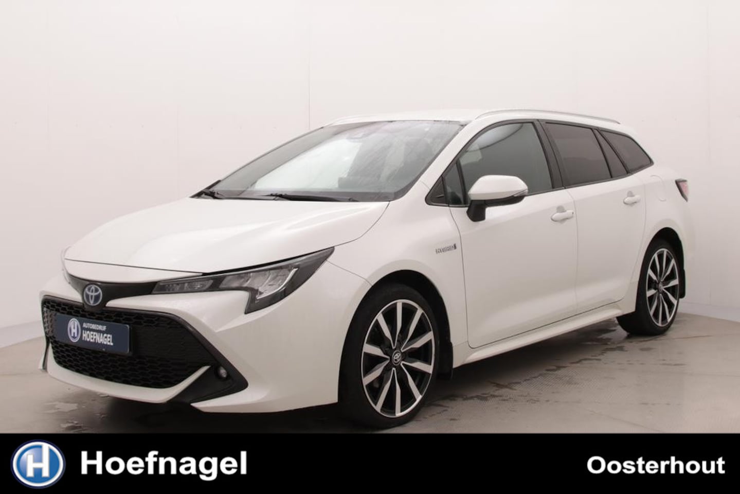 Toyota Corolla Touring Sports - 1.8 Hybrid Active | Automaat | Adaptive cruise control | CarPlay | Camera | Stoel & stuurv - AutoWereld.nl