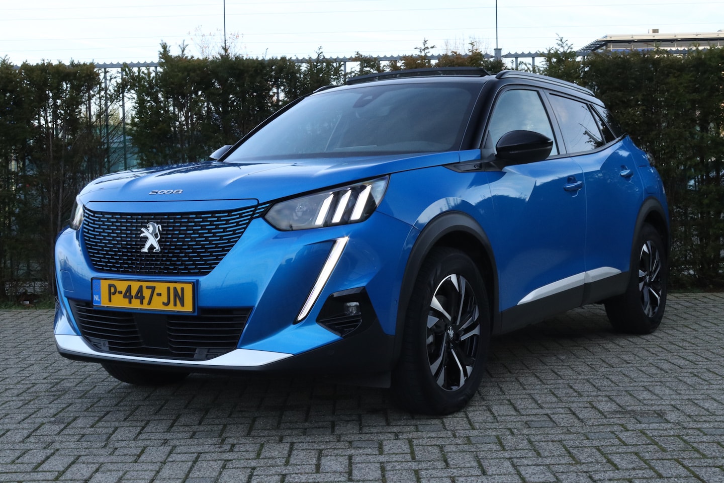 Peugeot e-2008 - EV GT 50 kWh | Adapt. Cruise | Scuif/kantel dak | Stoelverwarming | Camera | Keyless | Nav - AutoWereld.nl
