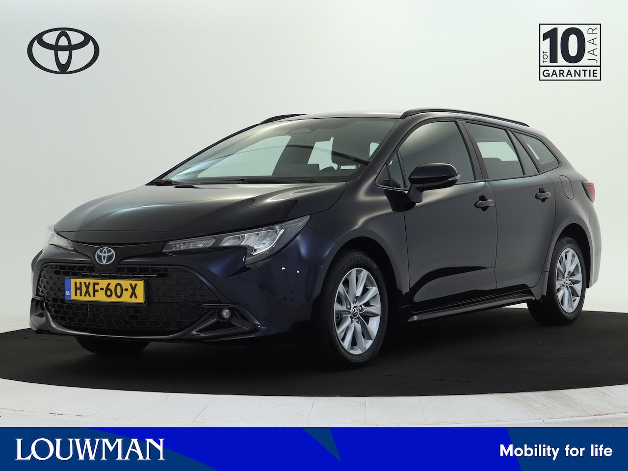 Toyota Corolla Touring Sports - Hybrid 140 Active | LM Velgen | Airco - AutoWereld.nl
