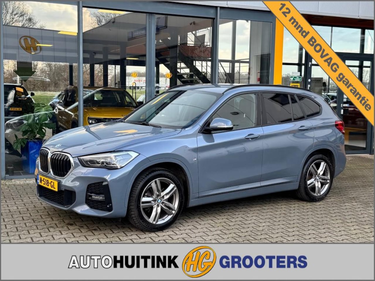 BMW X1 - sDrive18i High Executive - navi - stoelverwarming - trekhaak - AutoWereld.nl