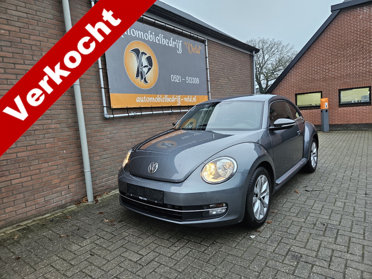 Volkswagen Beetle - 1.6 TDi BMT Design - AutoWereld.nl