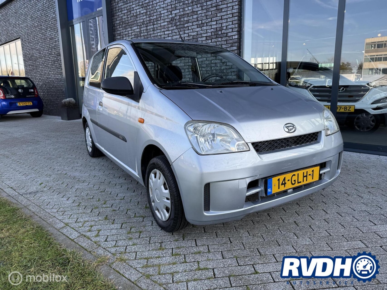 Daihatsu Cuore - 1.0 Summer Edition 1.0 Summer Edition - AutoWereld.nl