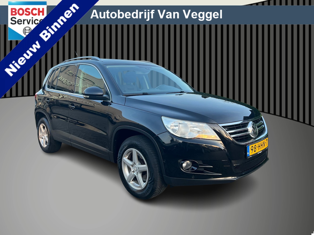 Volkswagen Tiguan - 1.4 TSI Sport&Style 4Motion trekhaak, cruise, airco, pdc - AutoWereld.nl
