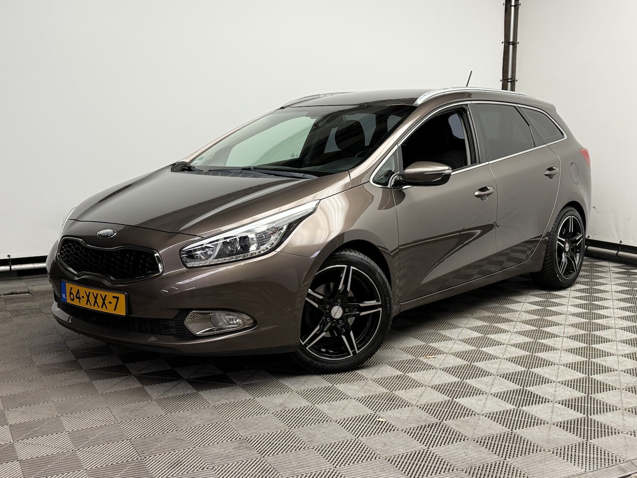 Kia Cee'd Sportswagon - 1.6 GDI Plus Pack Navi ECC Trekhaak NL Auto - AutoWereld.nl