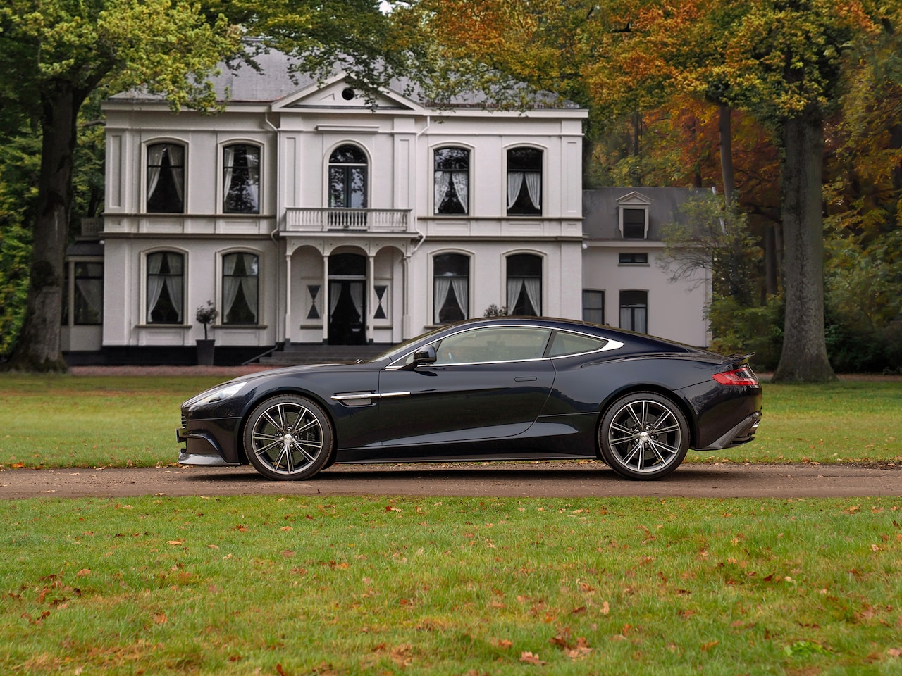 Aston Martin V12 Vanquish - 6.0 Touchtronic | Carbon Exterior | B&O | Stoelventilatie | Subliem! - AutoWereld.nl