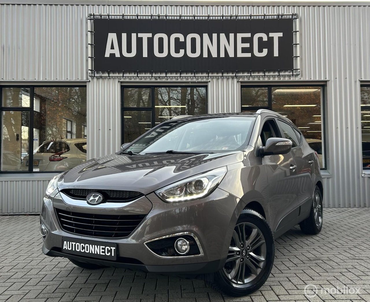 Hyundai ix35 - 2.0i i-AUTOMAAT, TREKH, HALF/LEDER, CRUISE - AutoWereld.nl