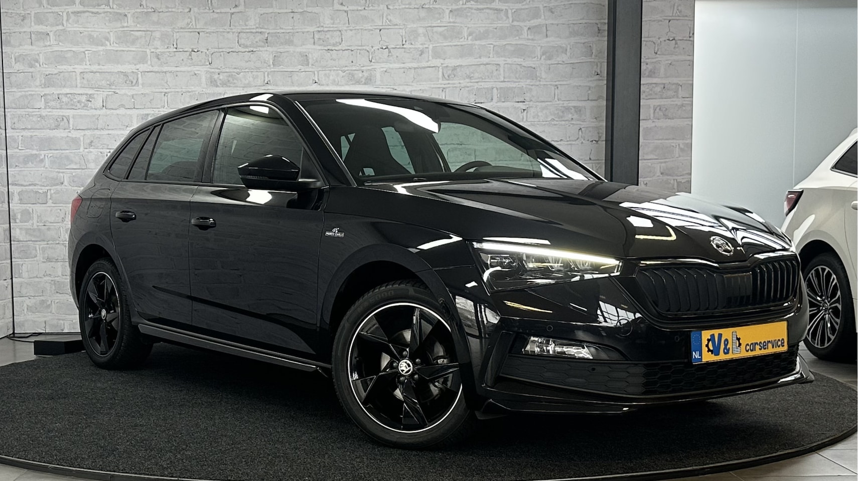 Skoda Scala - 1.0 TSI Monte Carlo / Pano / Stoelverwr. / Carplay - AutoWereld.nl