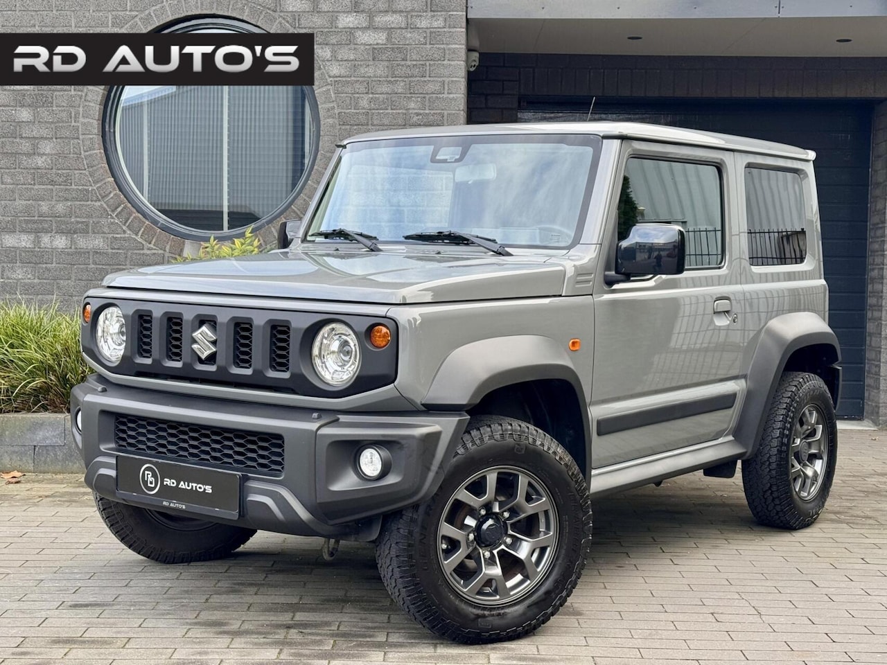 Suzuki Jimny - 1.5 Stijl All Grip 4Pers Led Navi Clima - AutoWereld.nl