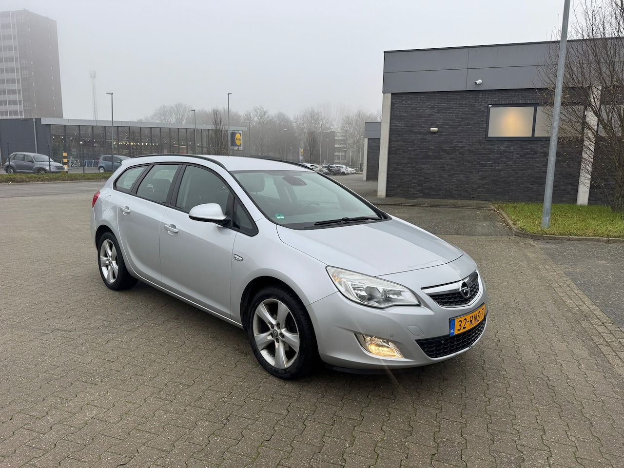Opel Astra Sports Tourer - 1.4 Turbo Edition 1.4 Turbo Edition - AutoWereld.nl