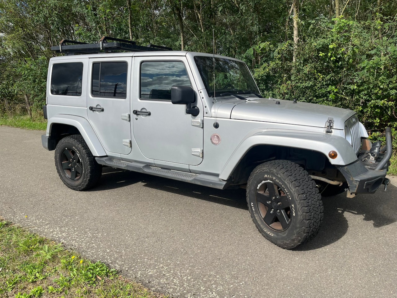 Jeep Wrangler Unlimited - 2.8 CRD Sahara Dakar edition - AutoWereld.nl