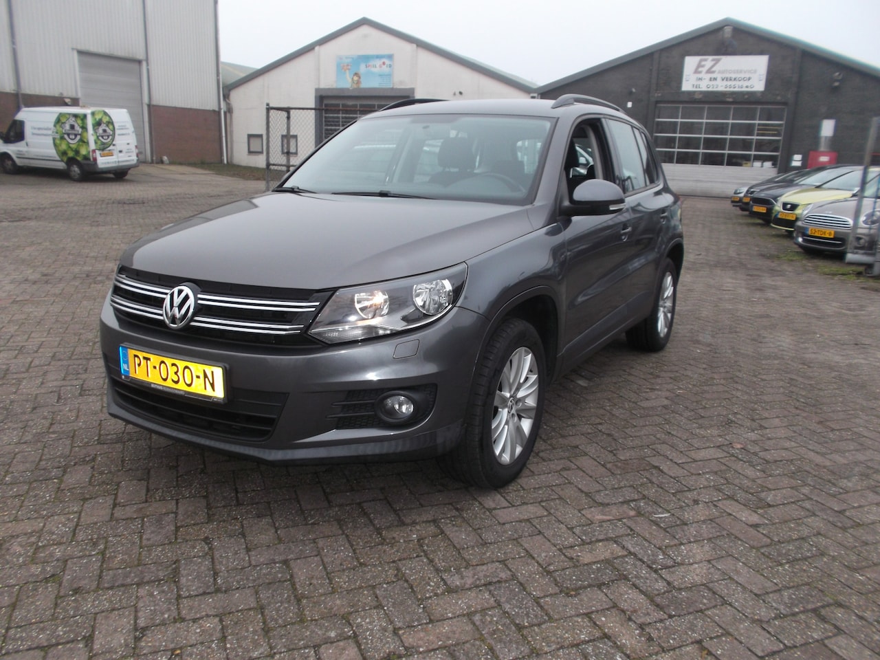 Volkswagen Tiguan - 1.4 TSI Sport&Style navi airco - AutoWereld.nl