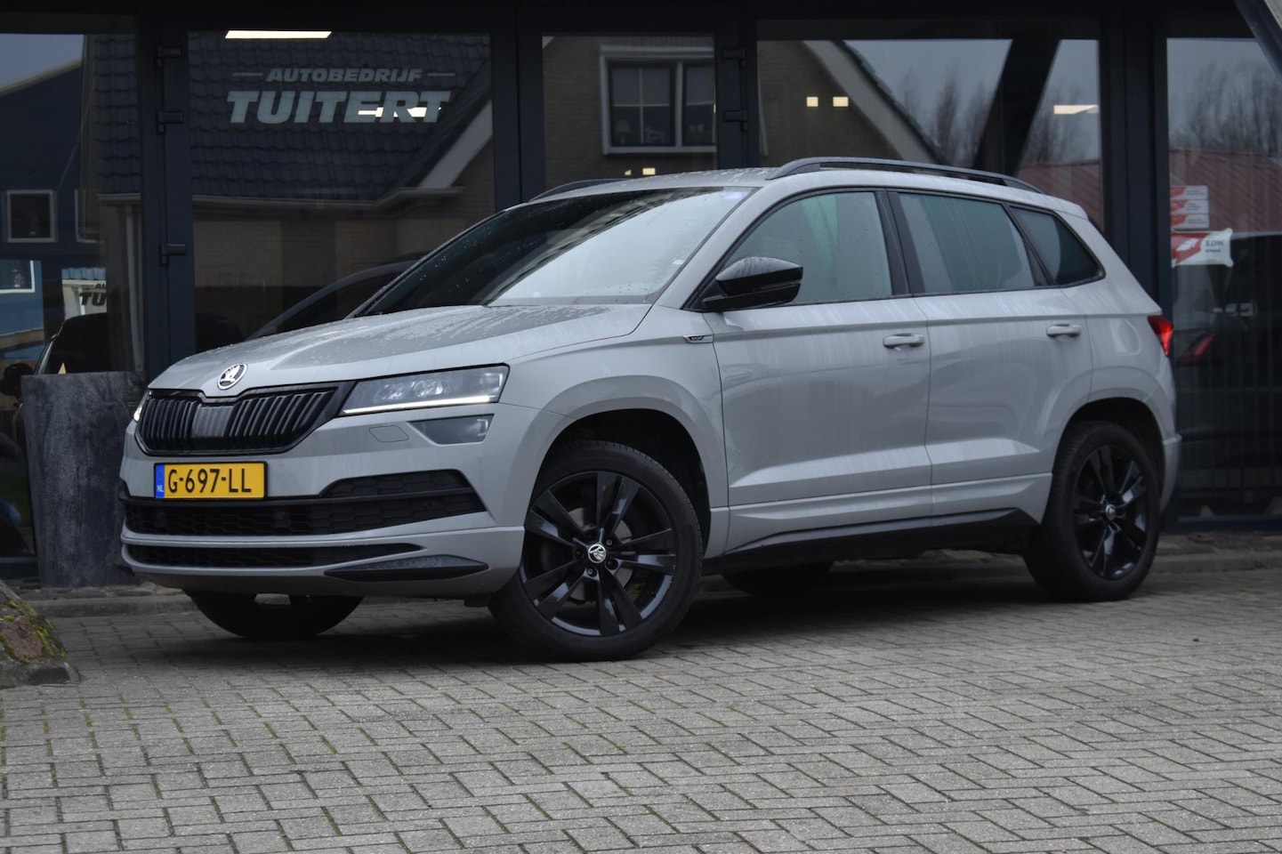 Skoda Karoq - 1.5 TSI ACT Sportline | TREKHAAK | CAMERA | NAP | CANTON | APPLE CARPLAY | ANDROID AUTO | - AutoWereld.nl