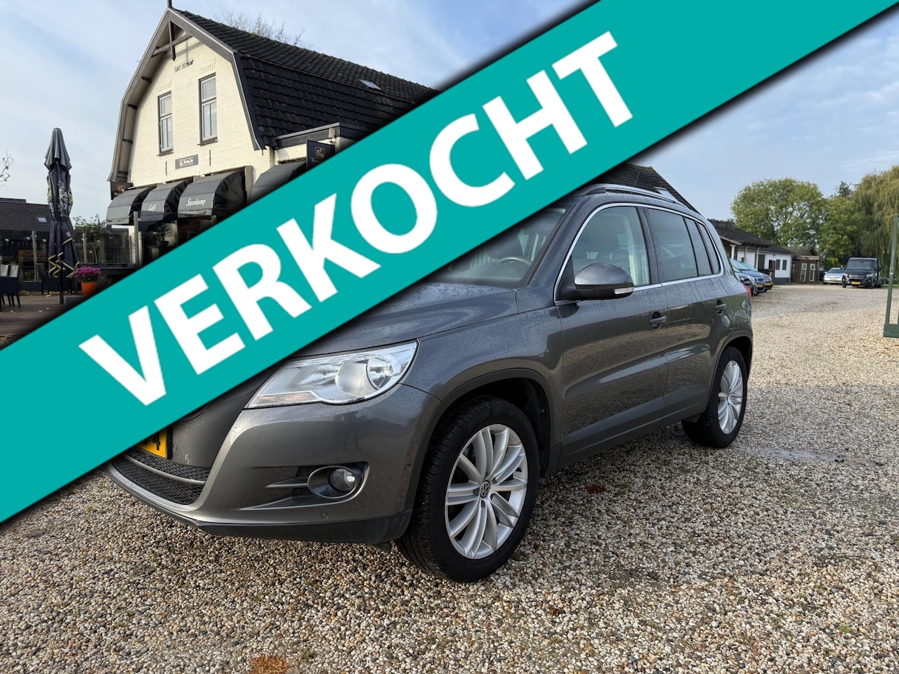 Volkswagen Tiguan - 1.4 TSI Sport&Style TEKST LEZEN | Navi | PDC | Trekhaak | Org. NL - AutoWereld.nl