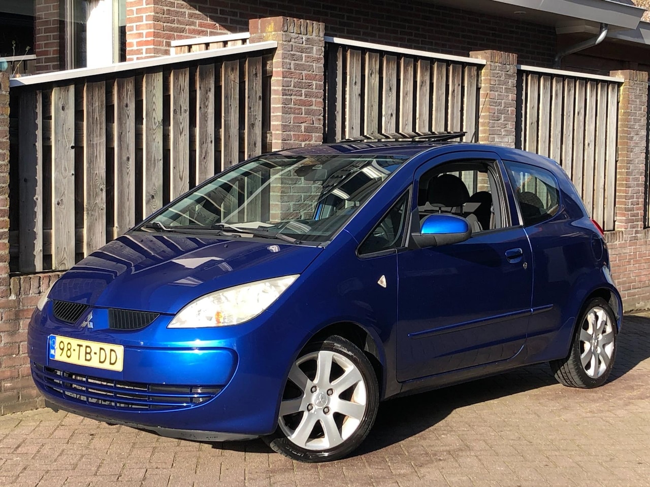 Mitsubishi Colt - 1.5 d'Azur AIRCO, elek.open dak, LM velgen, APK 11-2026! - AutoWereld.nl