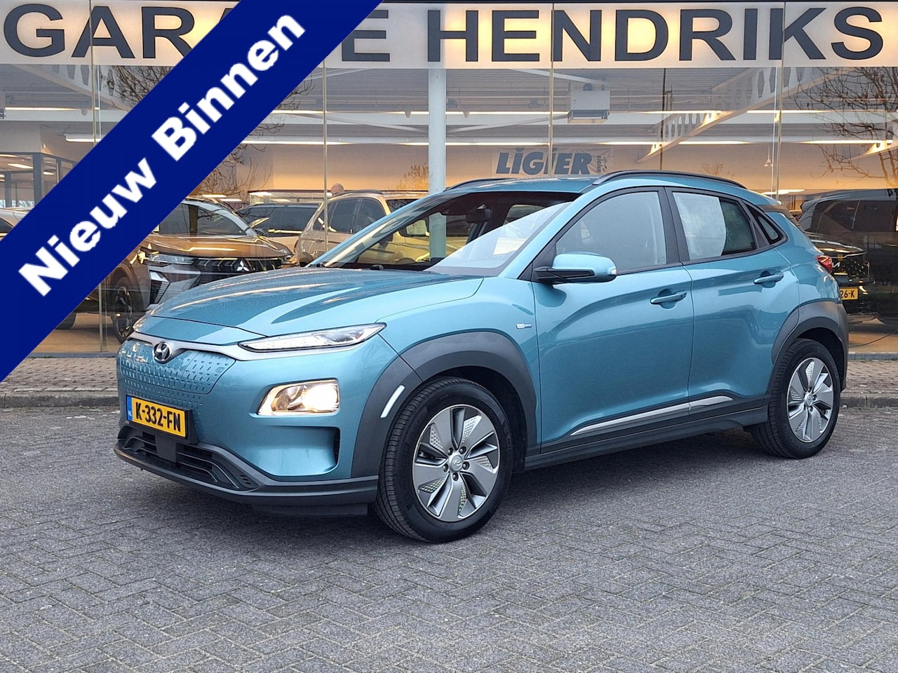 Hyundai Kona Electric - EV Comfort 64 kWh | 3 Fase | Warmtepomp | Navi | Adaptive CC | Climate | occasion - AutoWereld.nl