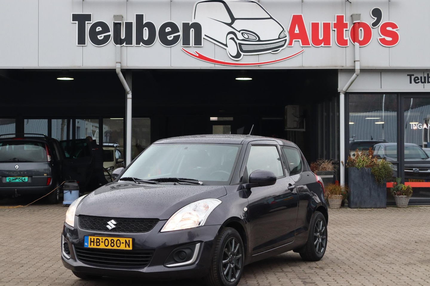 Suzuki Swift - 1.2 Comfort EASSS Airco, Stoelverwarming, Lichtmetalen wielen, Radio cd speler, Elektrisch - AutoWereld.nl