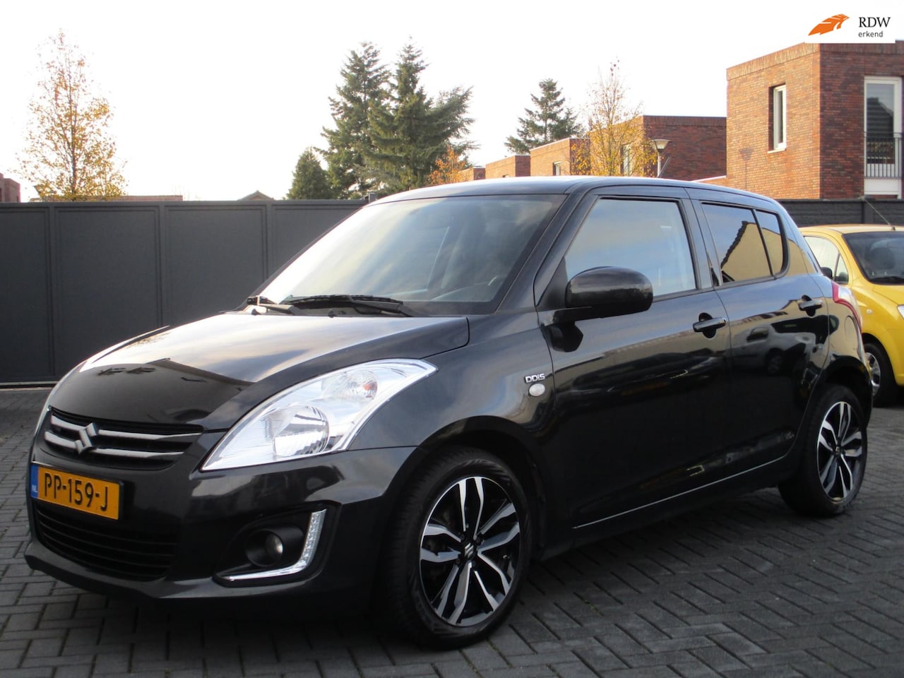 Suzuki Swift - 1.3 DDiS Comfort EASSS Airco Leer/Alcantara 5 Deurs ! - AutoWereld.nl