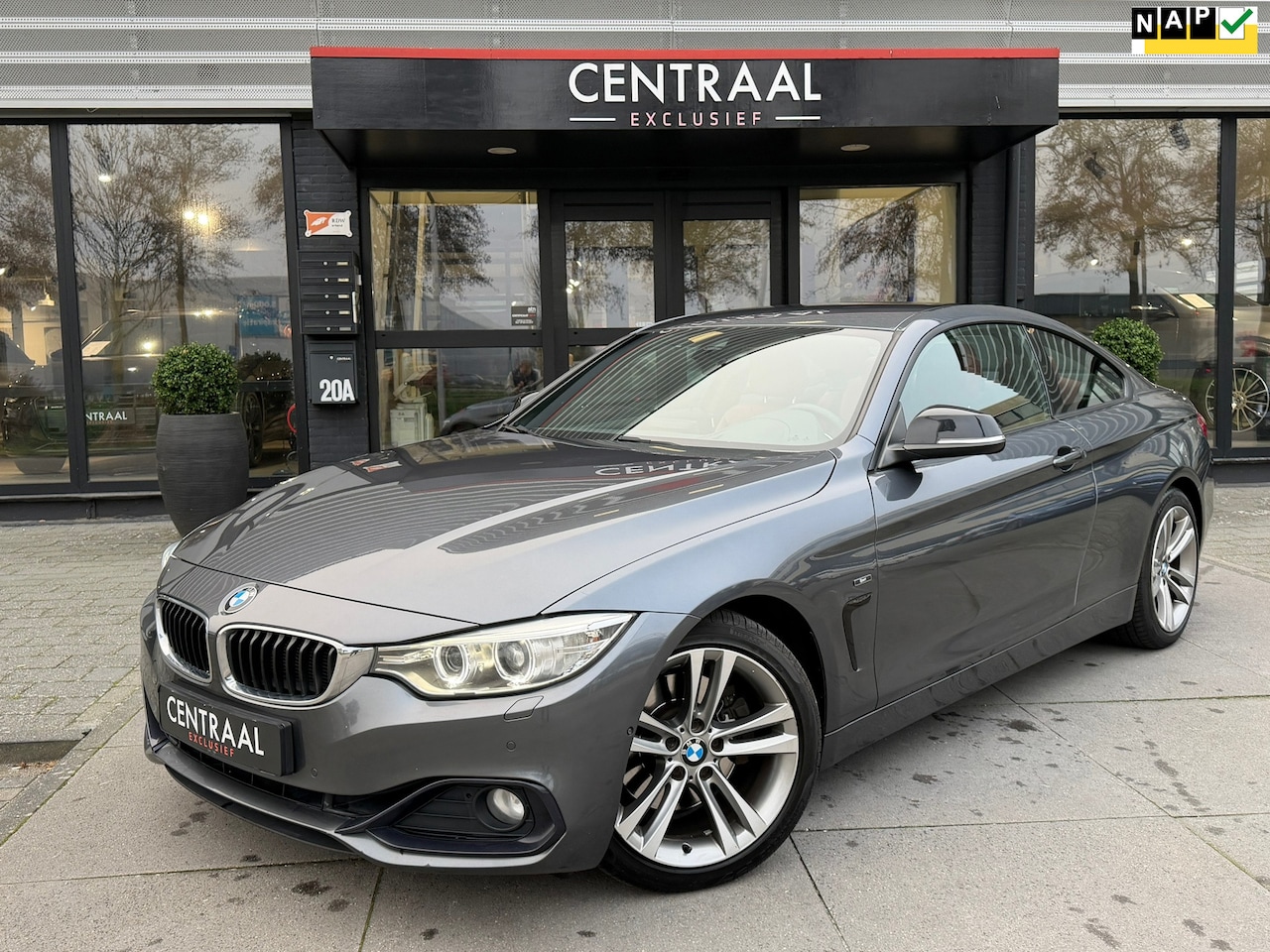 BMW 4-serie Coupé - 428i High Exe Sportline|Head-Up|Camera|Keyless|Leder|Stoelverwarming|NL-Auto - AutoWereld.nl