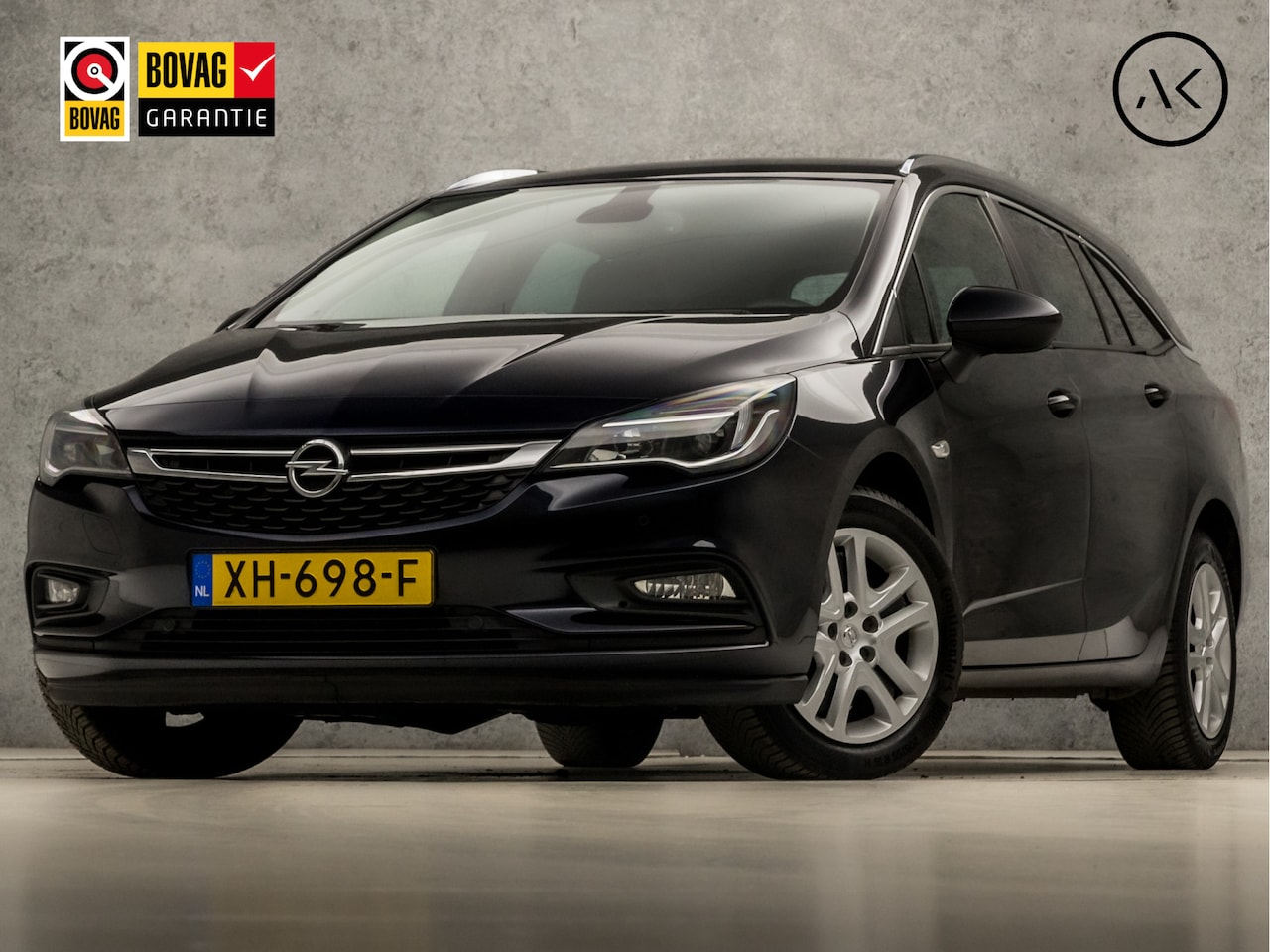 Opel Astra Sports Tourer - 1.0 Sport (APPLE CARPLAY, GROOT NAVI, CLIMATE, TREKHAAK, SPORTSTOELEN, GETINT GLAS, PARKEE - AutoWereld.nl