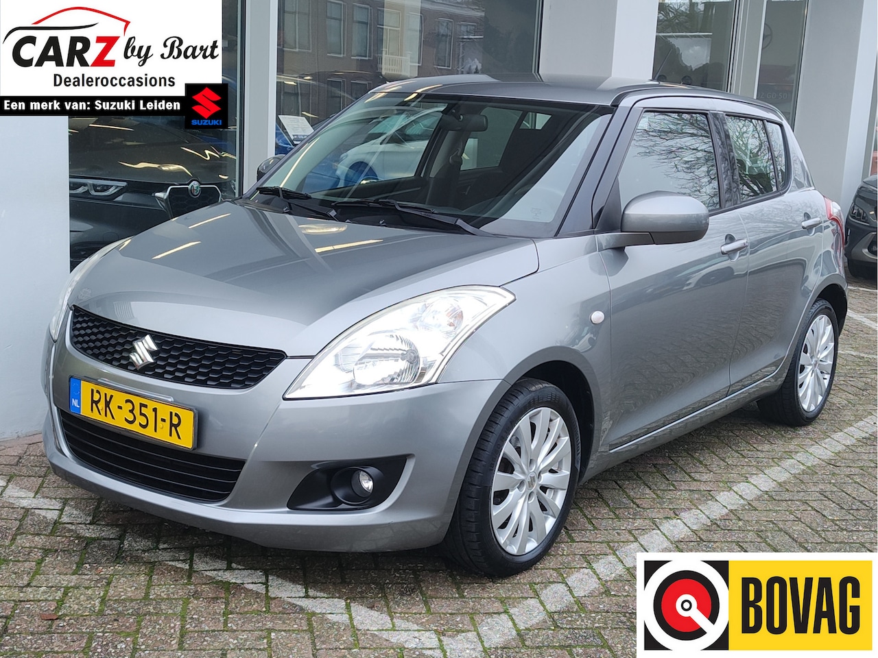 Suzuki Swift - 1.2 EXCLUSIVE EASSS Clima | Cruise | Stoelverwarming | Keyless - AutoWereld.nl